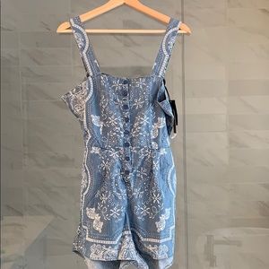 Denim romper with peep hole back